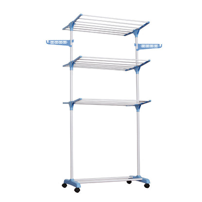 White folding drying rack with clothes in bedroom setting