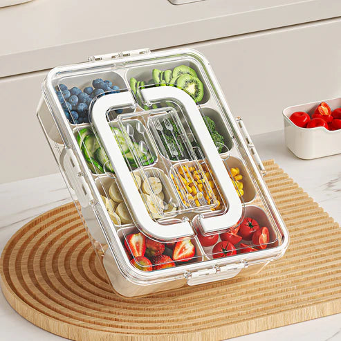 8 grid food storage container filled with fresh colorful fruits and snacks