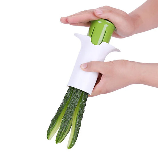 Hand using 6 blade fruit vegetable slicer cutter on cucumber