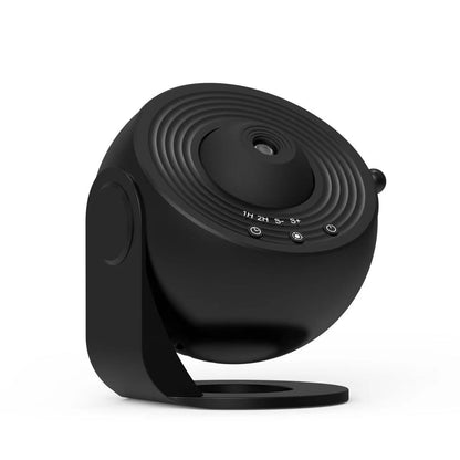 Galaxy projector night light in black on white background