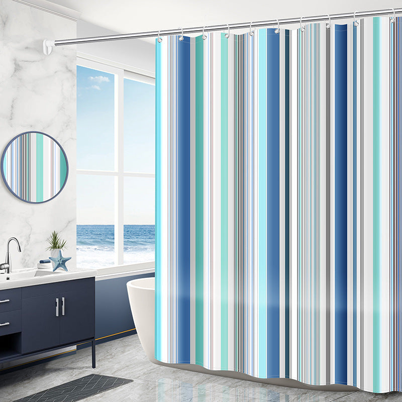 Geometric PEVA curtain used as standalone without liner on a bathroom curtain rod
