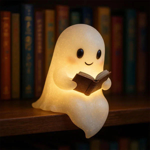 Ghost night light LED lamp glowing soft white on dark background for kids room