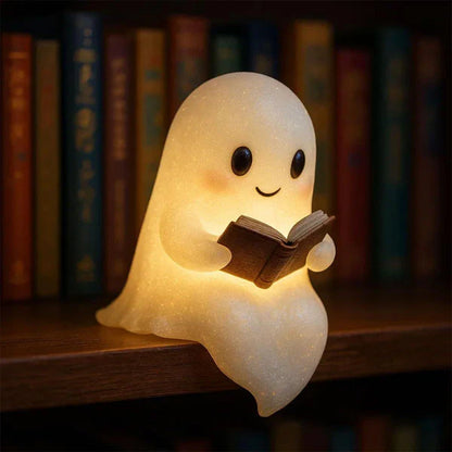 Ghost night light LED lamp glowing soft white on dark background for kids room