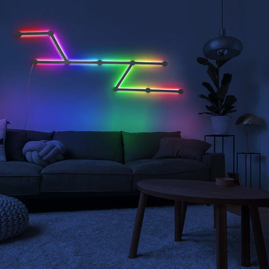 Graffiti intelligent splicing lamp installed as wall decor in living room
