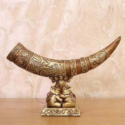 Hand carved elephant resin sculpture in gold