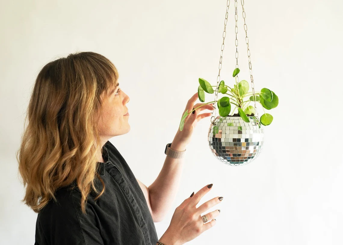 Hanging mirror ball flowerpot used as wall decoration