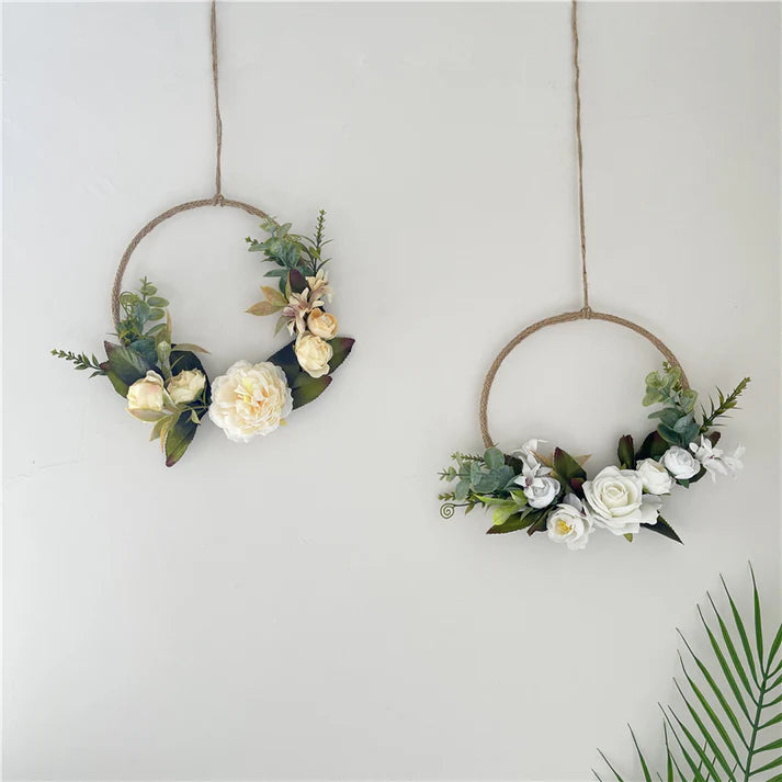 Close up of hanging metal wreath garland floral detail