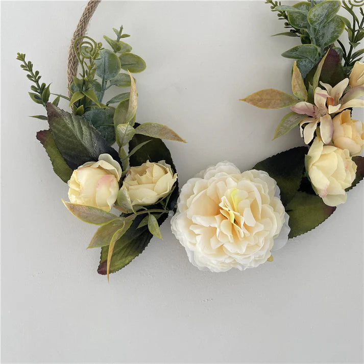 Hanging metal wreath garland styled in room setting
