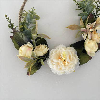 Hanging metal wreath garland styled in room setting