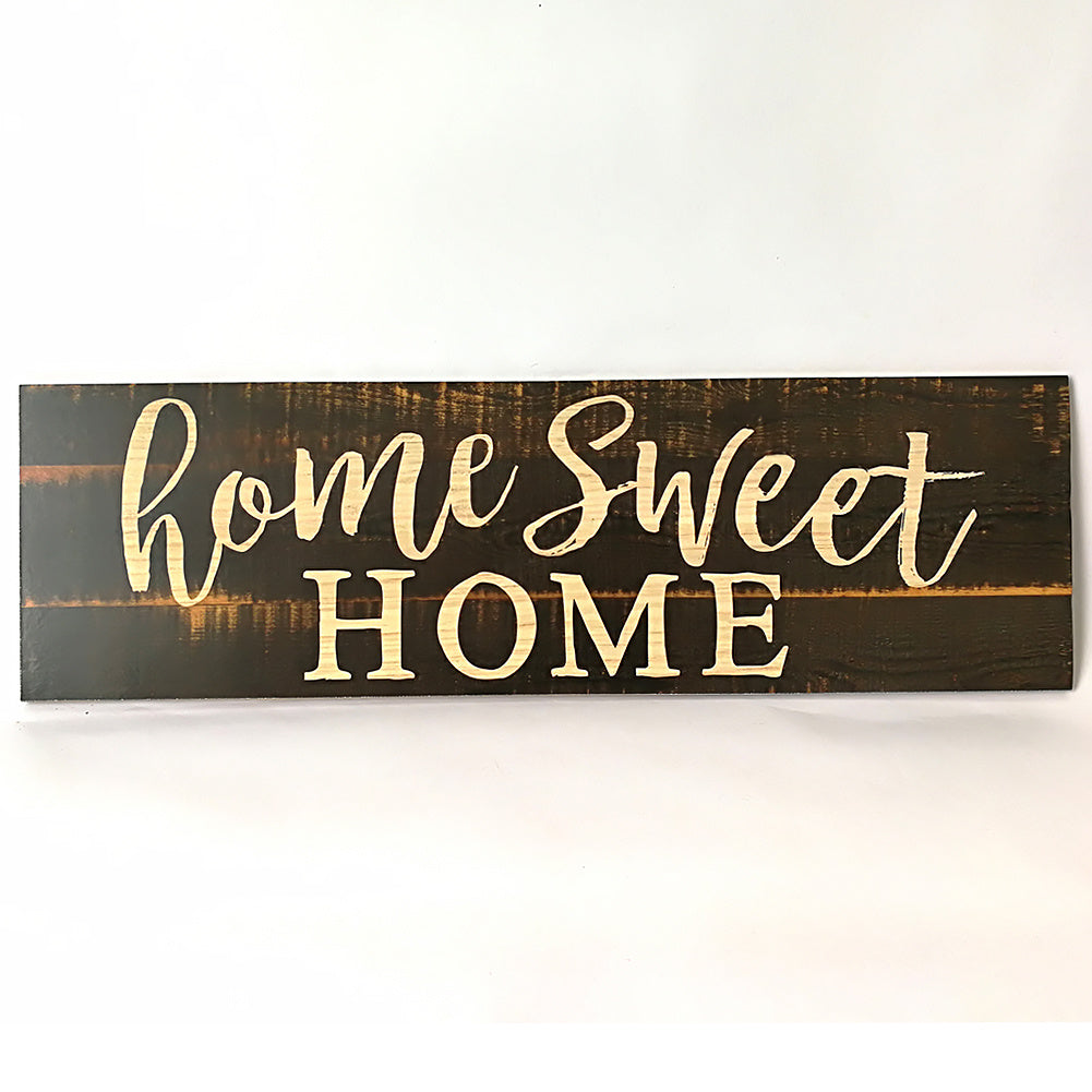 Home sweet home carved wooden wall sign in black color front view