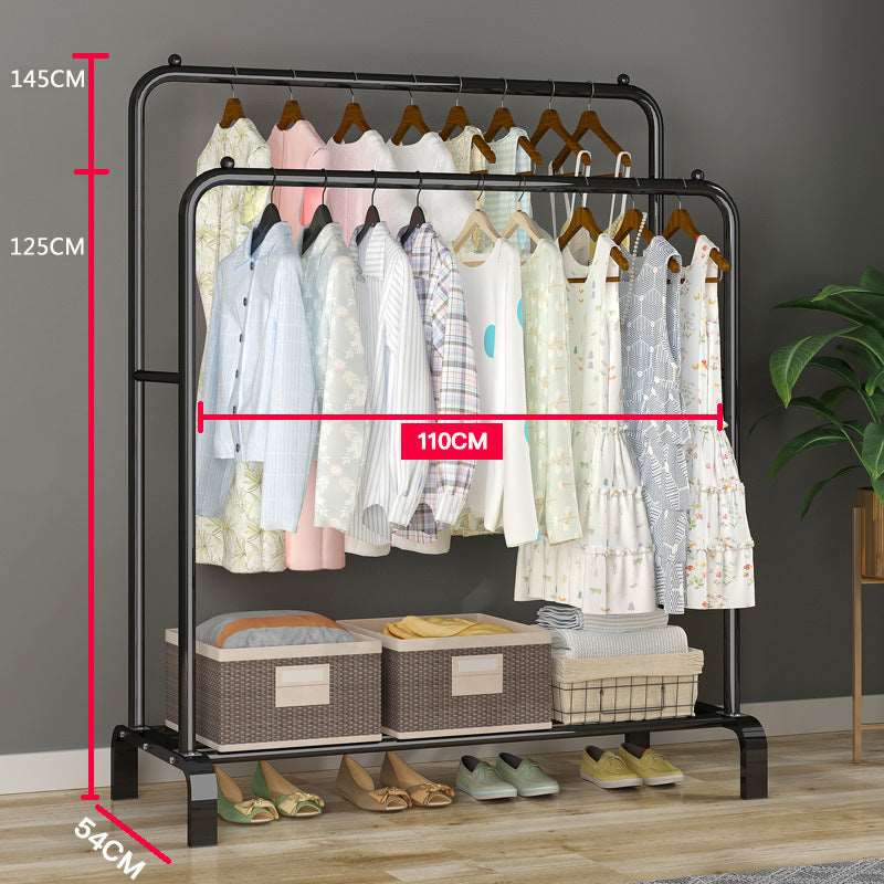 Indoor drying rack fully loaded with clothes and shoes underneath