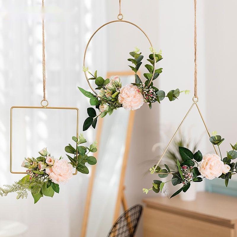 Iron flower wall hanging on a narrow hallway wall hanging flat without protruding into corridor
