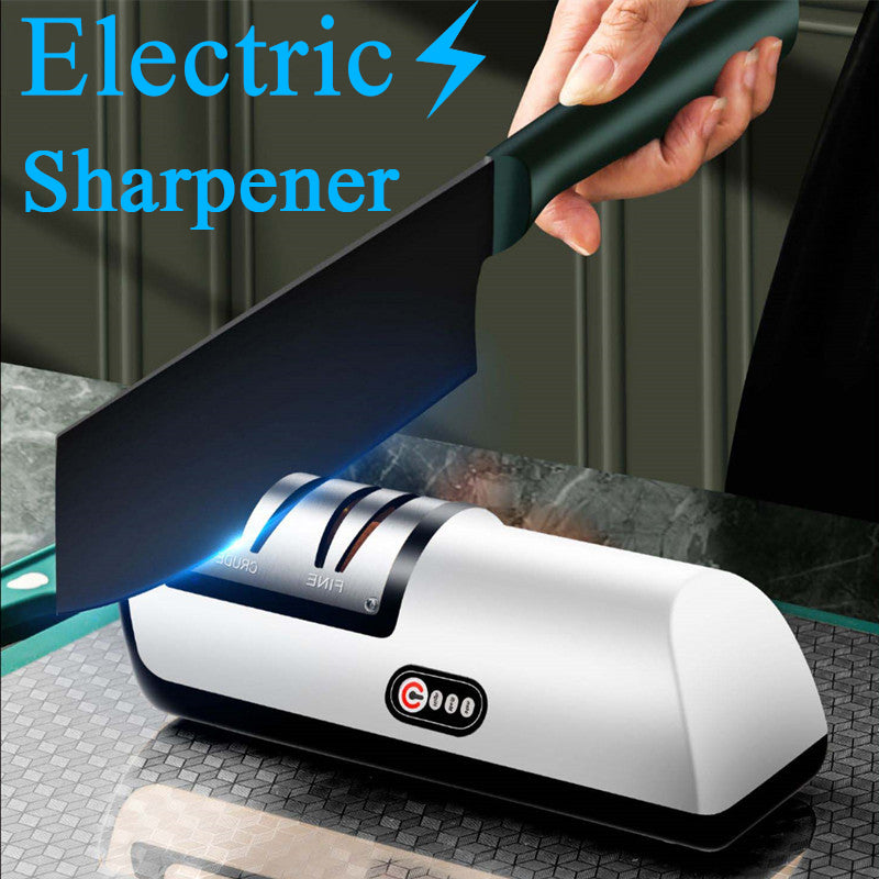 Electric knife sharpener being used on kitchen knife