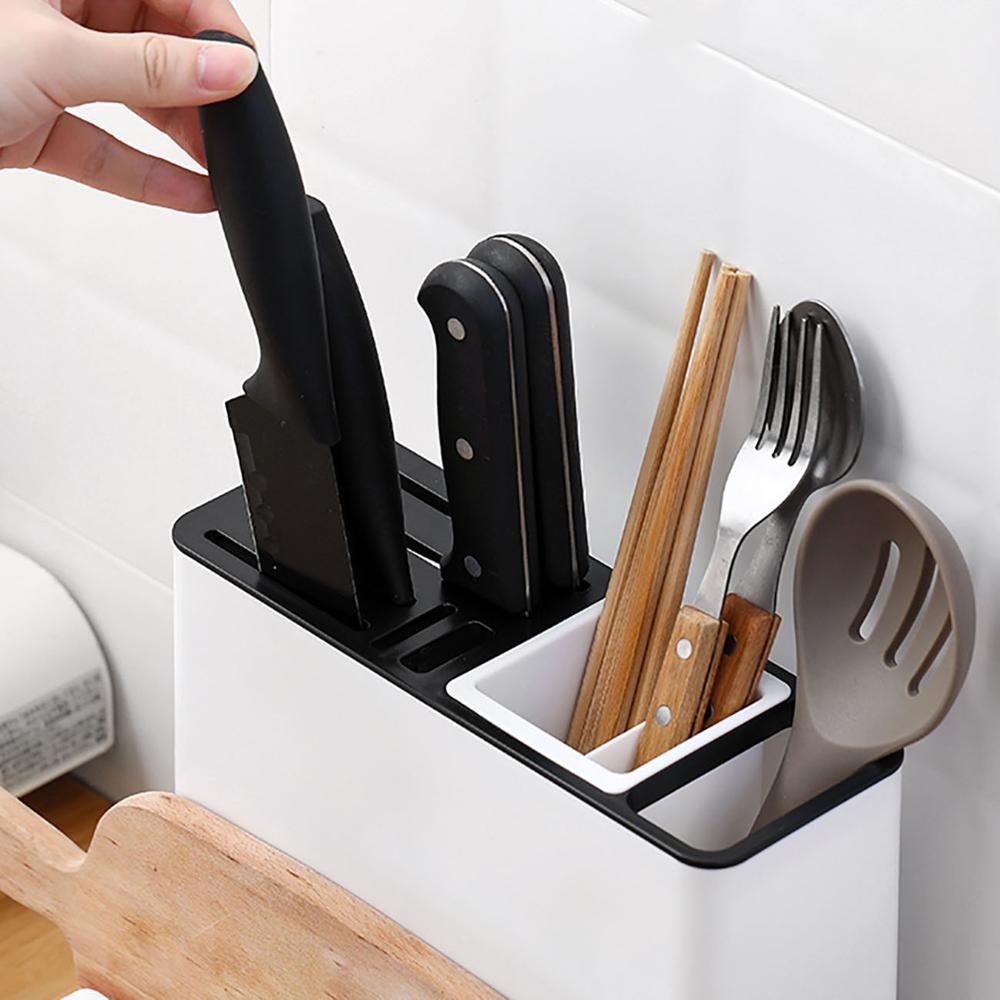 Knife storage rack holding knives and kitchen utensils