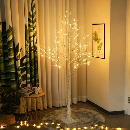 LED birch tree lights used as doorway decor
