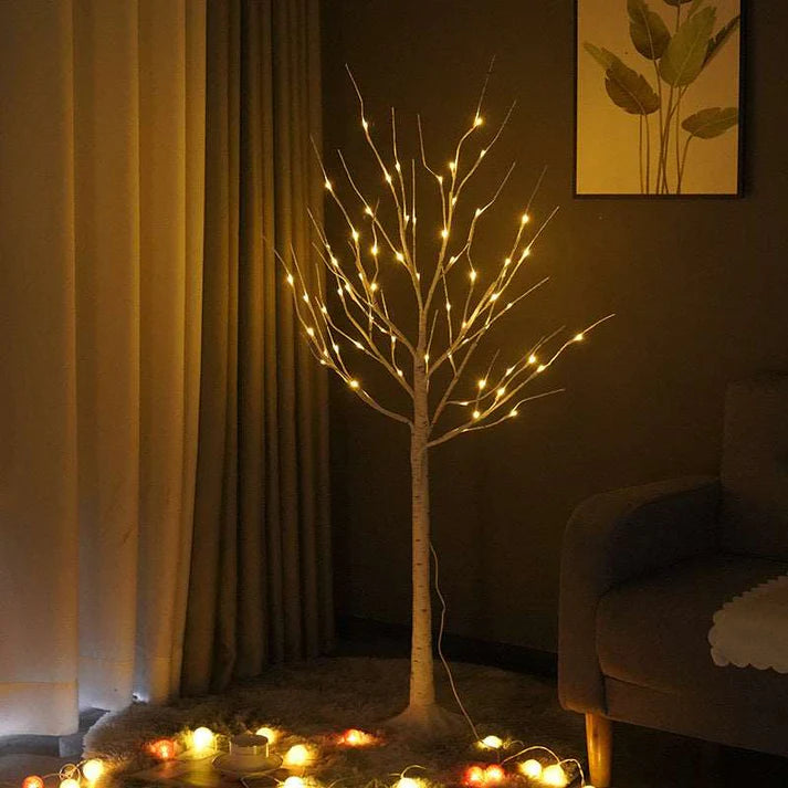 LED birch tree lights placed near hallway entrance
