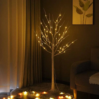 LED birch tree lights placed near hallway entrance
