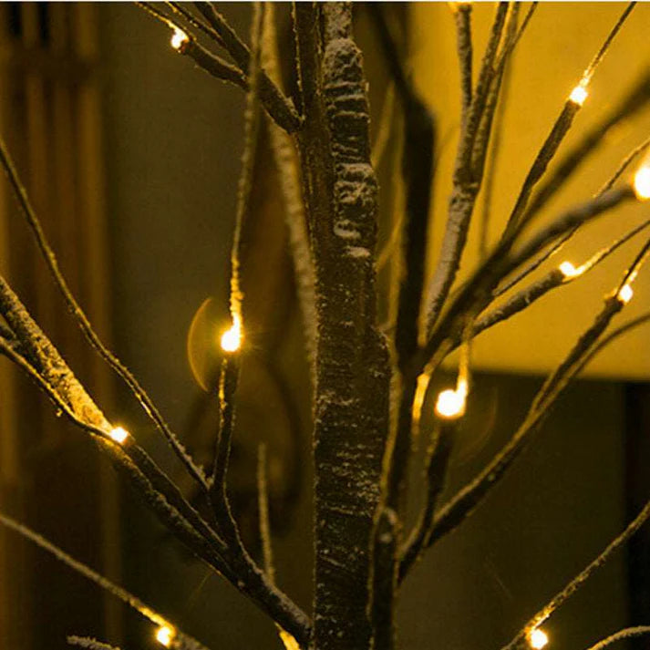 Nighttime ambiance created by LED birch tree lights
