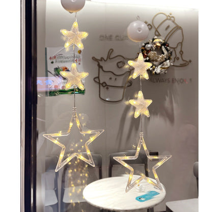 Close up of LED star and moon hanging lights