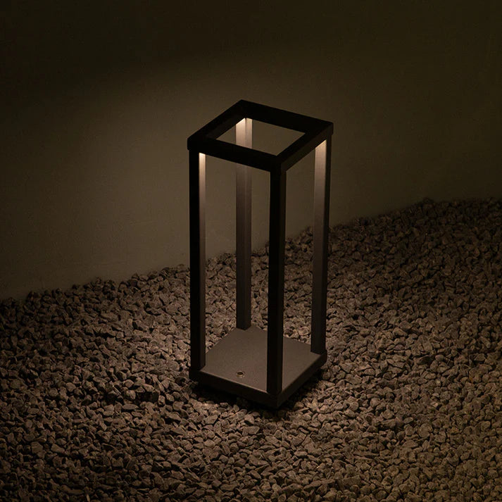 Rechargeable art table lamp used in outdoor evening setting