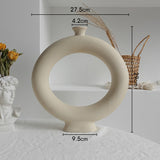 Nordic matte ceramic vase used as a dining table centerpiece with dried lavender arrangement