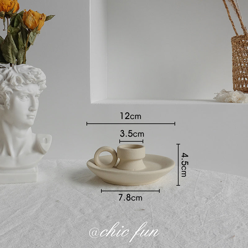 Two matte ceramic vases side by side showing natural tone and texture variation between pieces
