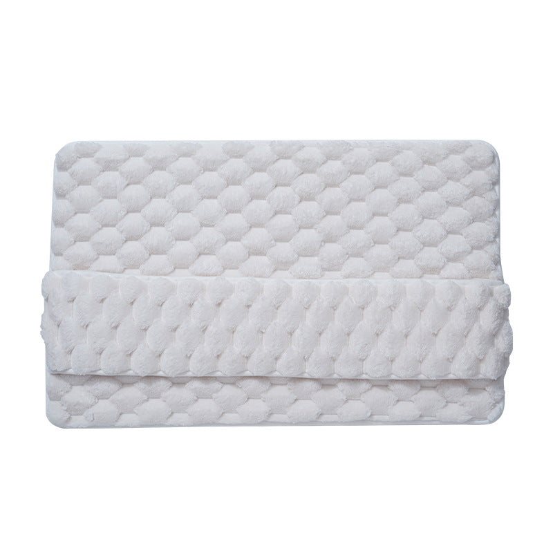 Foot pressing into the memory foam bathroom mat showing compression and cushion underfoot
