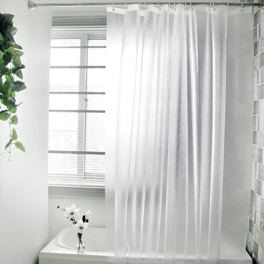 Waterproof mildew resistant PEVA shower curtain hanging on a bathroom rod over a bathtub
