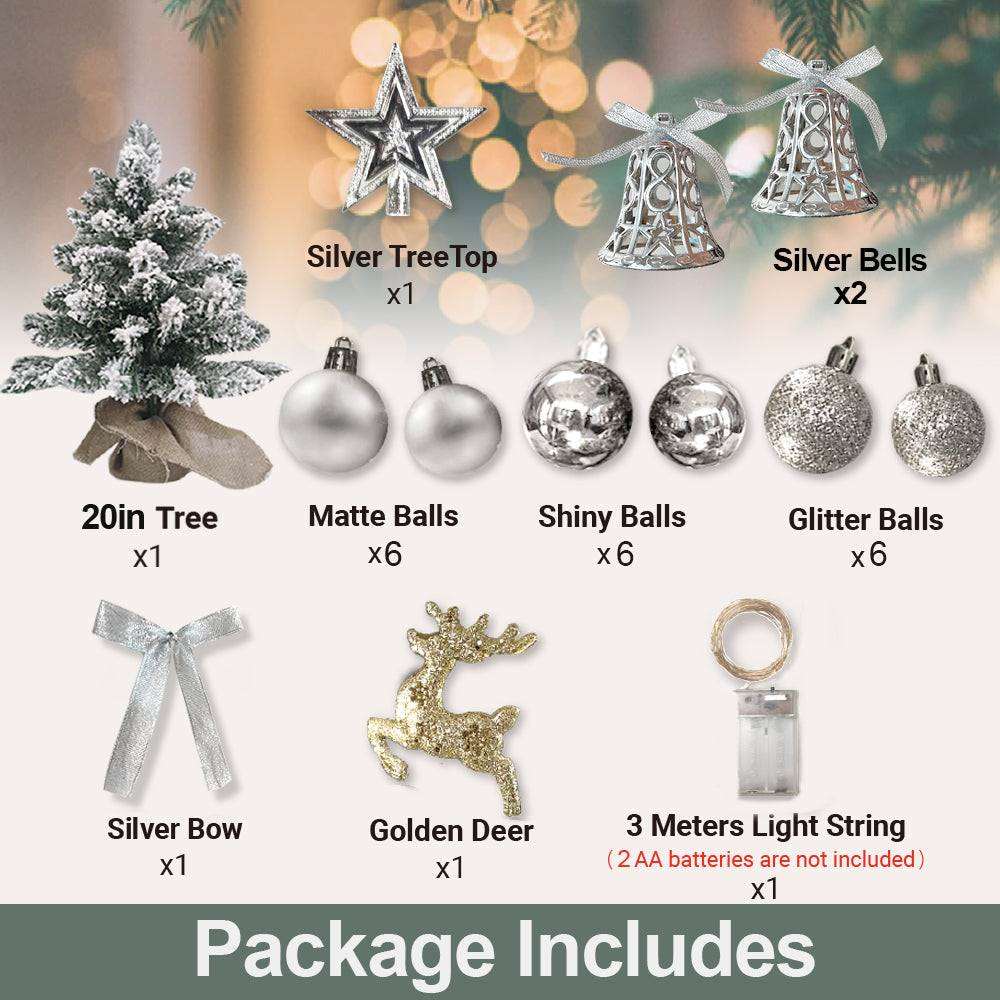 Flocked mini Christmas tree with silver ornaments