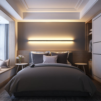 Minimalist LED wall lamp installed in bedroom setting