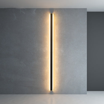Minimalist LED wall lamp glowing in dark room