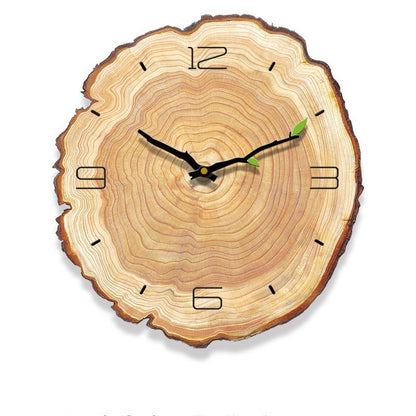 Nordic ring wall clock with 4 hour markers on a light gray bedroom wall
