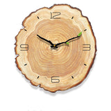 Nordic ring wall clock with 4 hour markers on a light gray bedroom wall