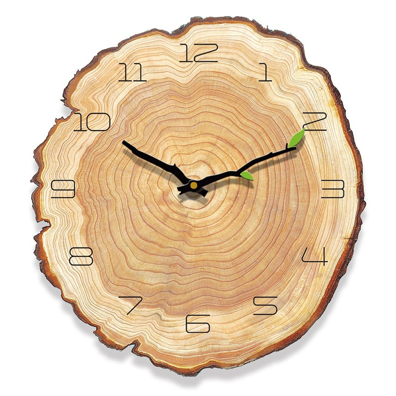 Plain annual ring style minimalist wall clock with no numbers on a neutral wall
