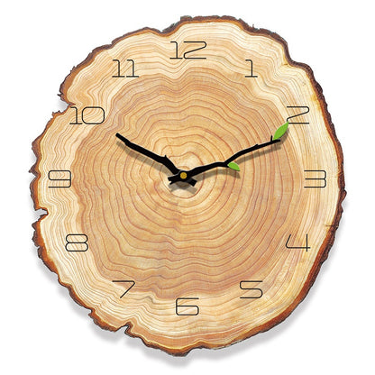 Plain annual ring style minimalist wall clock with no numbers on a neutral wall
