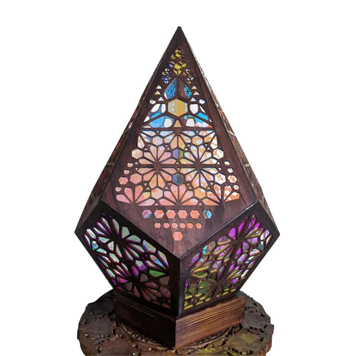Brown geometric moon and stars projection lamp on display