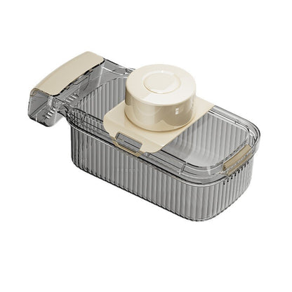 Multifunctional vegetable chopper and slicer in use on kitchen counter