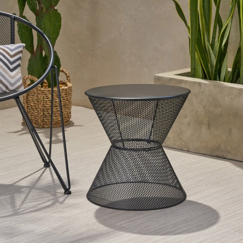 Nevada iron side table used in outdoor garden setting