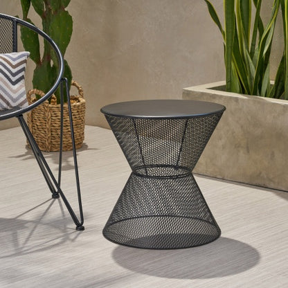Nevada iron side table used in outdoor garden setting