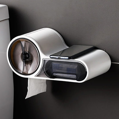 No drill self adhesive toilet paper holder mounted on white ceramic tile in a modern bathroom
