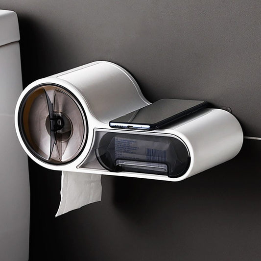 No drill self adhesive toilet paper holder mounted on white ceramic tile in a modern bathroom
