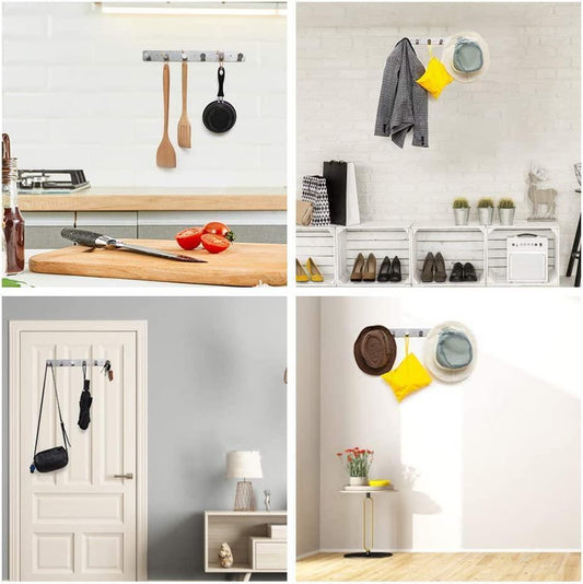 Towel hanging on a self adhesive stainless steel no drill wall hook in a modern bathroom
