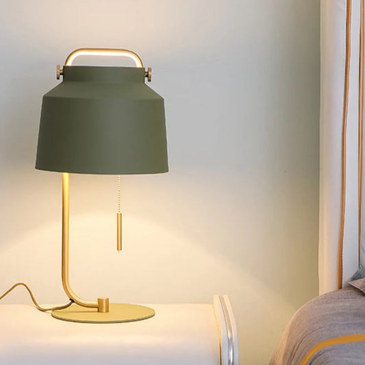 Green Nordic decorative table lamp on bedside table