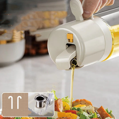 Olive oil sprayer bottle drizzling oil on fresh salad