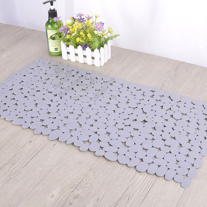 Pebble PVC bathroom mat shown at full 70x36cm size on a bathroom floor beside a ruler
