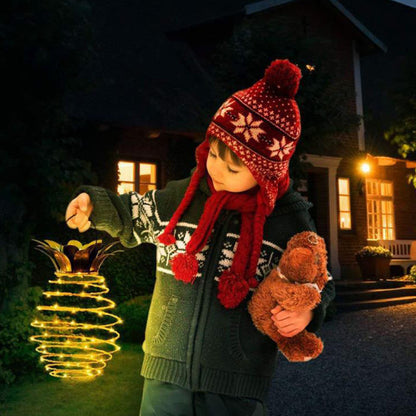Pineapple solar light placed on garden path at night