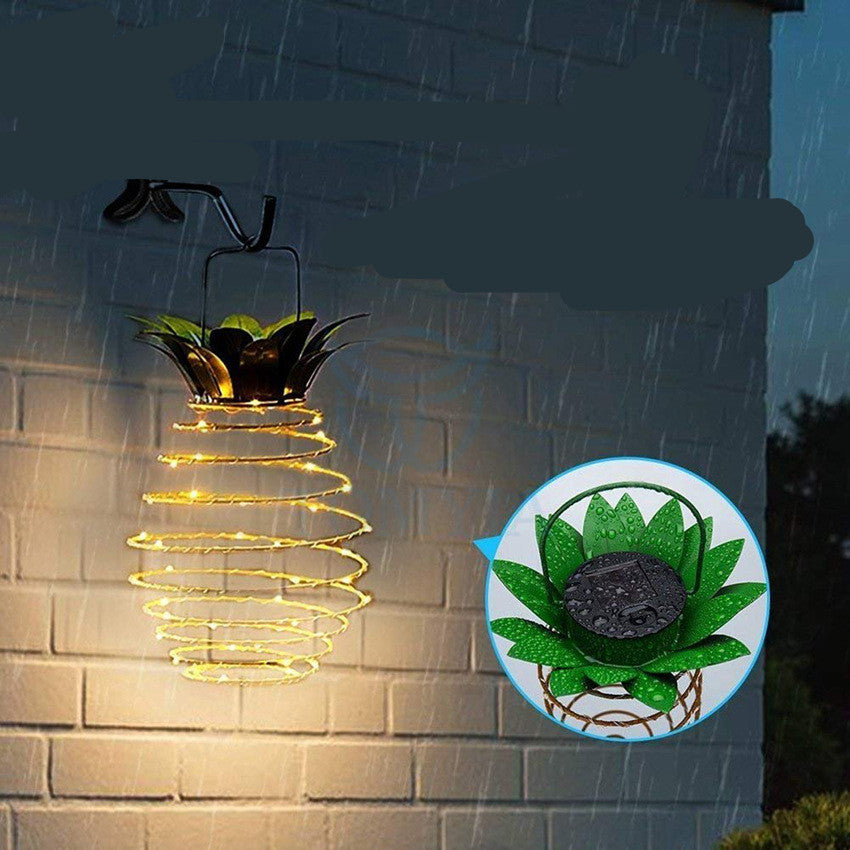 Pineapple solar garden light green leaf top detail close up