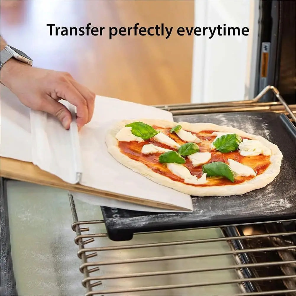 Pizza shovel transferring pizza from oven to table