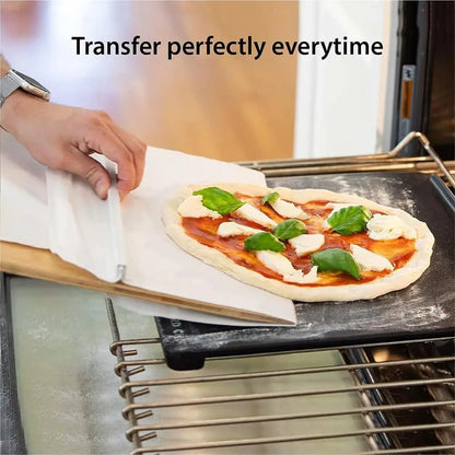 Pizza shovel transferring pizza from oven to table