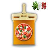 Pizza shovel being used with baked goods and pastries